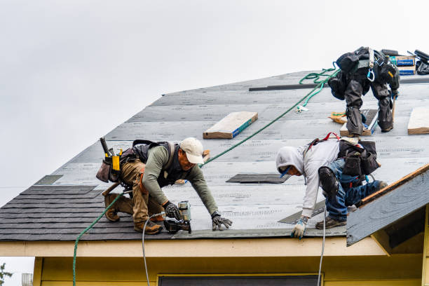 Professional Gutter Installation technician working in Valley, WA